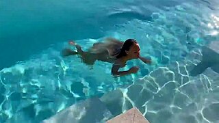 gorgeous monika fox with big tits and pierced nipples swims naked in pool at beautiful outdoor place