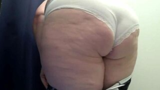 Big ass chubby milf tries tight leggings in fitting room while camera watches close-up 😏