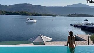 gorgeous monika fox with big tits and pierced nipples swims naked in pool at beautiful outdoor place