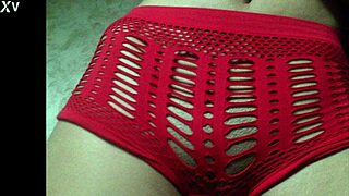 Woman in shorts starts teasing with curly hair and small waist in close-up shots