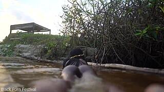 skinny african hottie teases softly in water