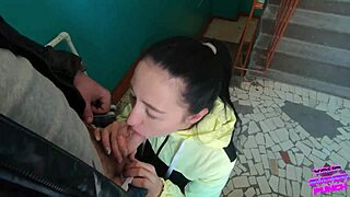 Risky blowjob on public staircase with brunette teen sucking huge cock and swallowing cum pov