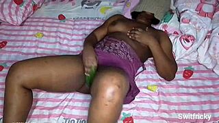 This curvy ebony babe got so horny she grabbed a cucumber and fucked her fat pussy solo.