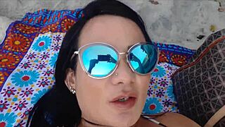 Oh man, I was just chillin' at the beach, relaxin' with this beautiful Latina, lickin' her big clit, feelin' so good and carefree today