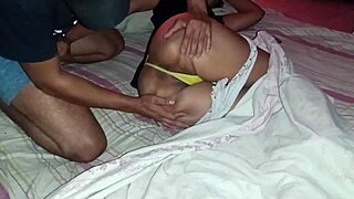 Young woman meets older man for a passionate encounter in the bedroom.