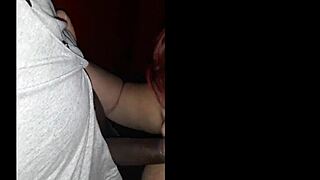 At the swingers' party in the African night club, the redhead gets drawn into a gloryhole for wild oral action and pussy pounding with black cocks.