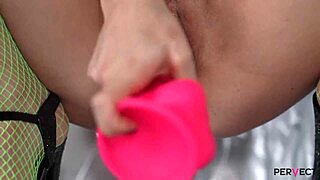 pervect liz rainbow slips into fishnets and heels, teasing with her puffy nipples and petite redhead body. she slides in a buttplug and dildo, making you watch her solo play to orgasm.