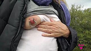 hey check out this kinky mother flashing extreme pierced nipples and sexy ass on public street