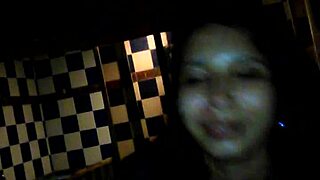 busty brunette babe chats about her skills in a hotel setting