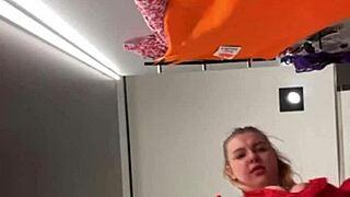 In a daring public escapade, the young blonde with big tits gets fucked intensely in the changing room.