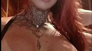 why is this hot redhead teasing fans online with her pink tits?