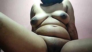 Indian Woman with Saggy Tits Engages in Open Encounter