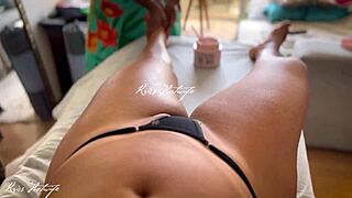 During the massage session the slutty Brazilian wife flashes cameltoe and goes topless in tiny bikini exposing everything to the masseur