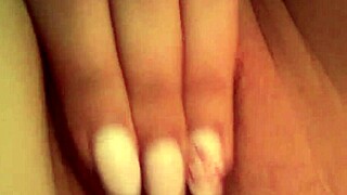 Young amateur explores shaved pussy masturbation in tight solo session leading to intense orgasm.