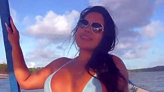 brazilian latina wife in bikini on boat ride... showing off her curves