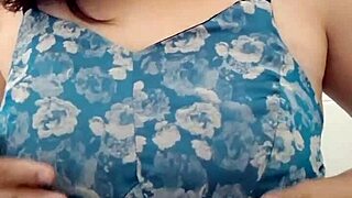 in a quiet scene the solo asian babe with big natural tits gently plays with balloons alone