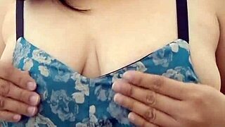 in a quiet scene the solo asian babe with big natural tits gently plays with balloons alone