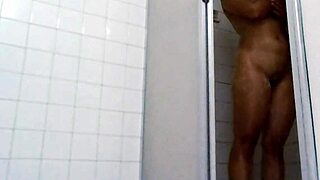Real couple gets intensely wet in steamy home bathroom shower session