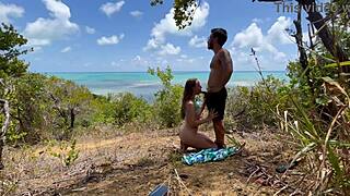 This sexy fit woman enjoys a beautiful day outdoors on the Brazilian beach with friends
