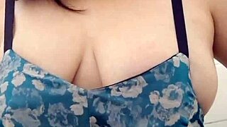 in a quiet scene the solo asian babe with big natural tits gently plays with balloons alone