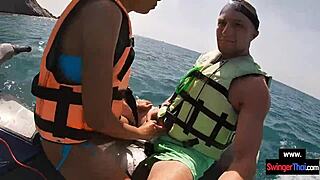 Oh man this Asian girlfriend is giving a blowjob in public on a jetski with her boyfriend.