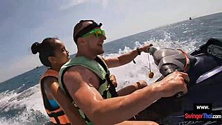 Oh man this Asian girlfriend is giving a blowjob in public on a jetski with her boyfriend.