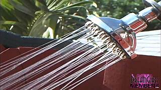 hot brunette shaves her asshole and hairless pussy in an outdoor shower for solo fun