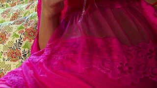 Exotic Thai tranny beauty Amy spanks her cock in fishnets and heels on bed!