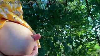 Pregnant milf wife milks her own huge lactating boobs in public outdoor setting