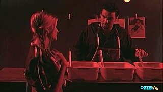 Oh yeah, this tattooed brunette in sexy lingerie and heels is getting fucked hard in that dark room!