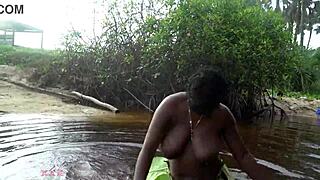watch this busty african beauty with huge tits and ass grinding in a ritual dance then cleansing her thick body in sacred outdoor water