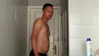 Oh wow, I'm watching this delicious guy drink and shave his huge monster cock