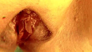 mature blonde cougar spreads her huge gaping shaved pussy lips upskirt