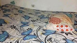 In a homemade video, a Venezuelan woman connects intimately with her Colombian partner in an amateur couple setting.