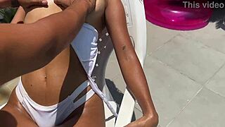 lucky stranger massages this cute skinny latina slut at the hotel pool 😏 her natural tits and pussy get fingered