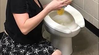 pretty brunette milf pees showing off perfect ass in bathroom